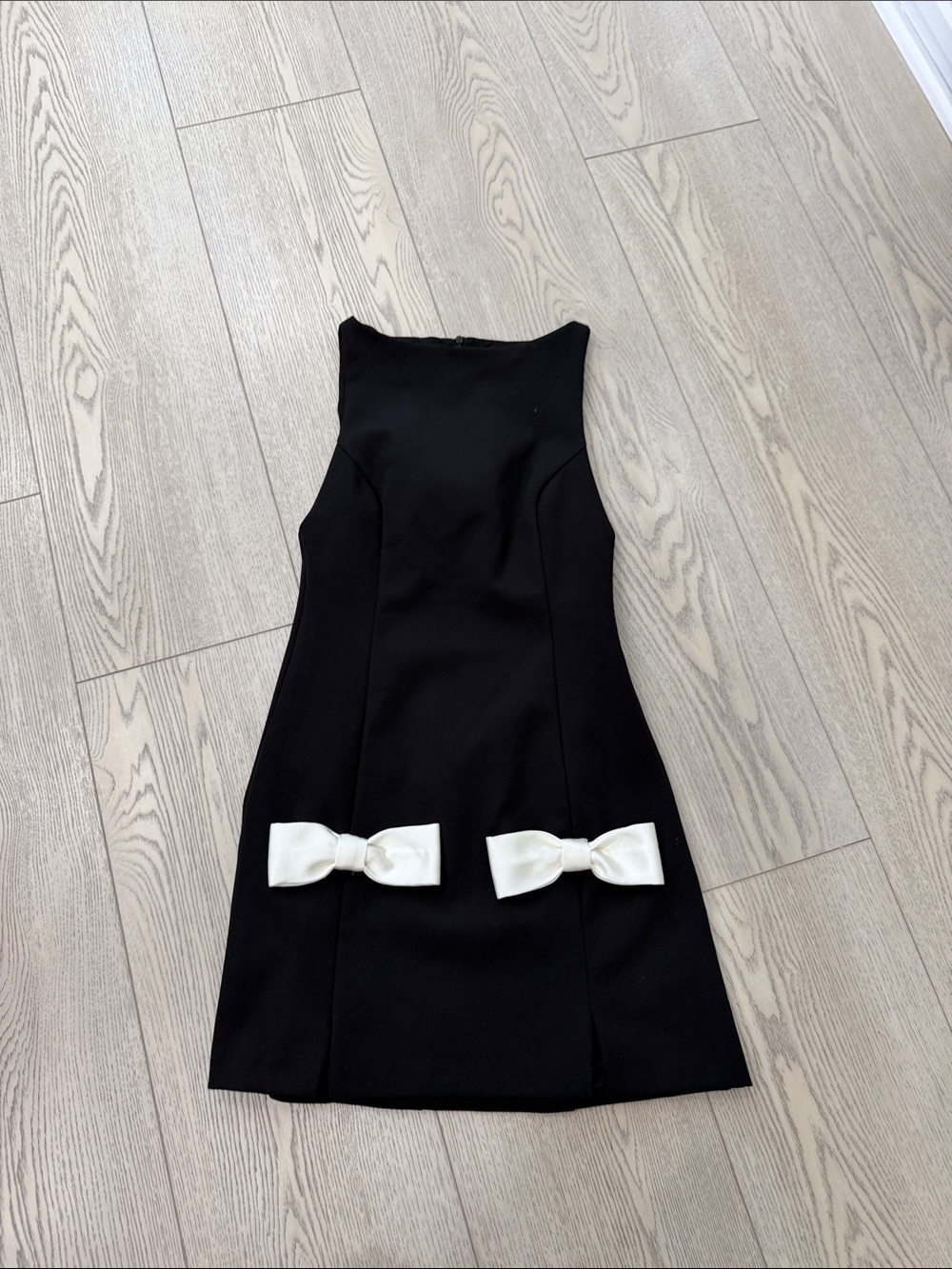 Classic Black Dress with White Bow Accents